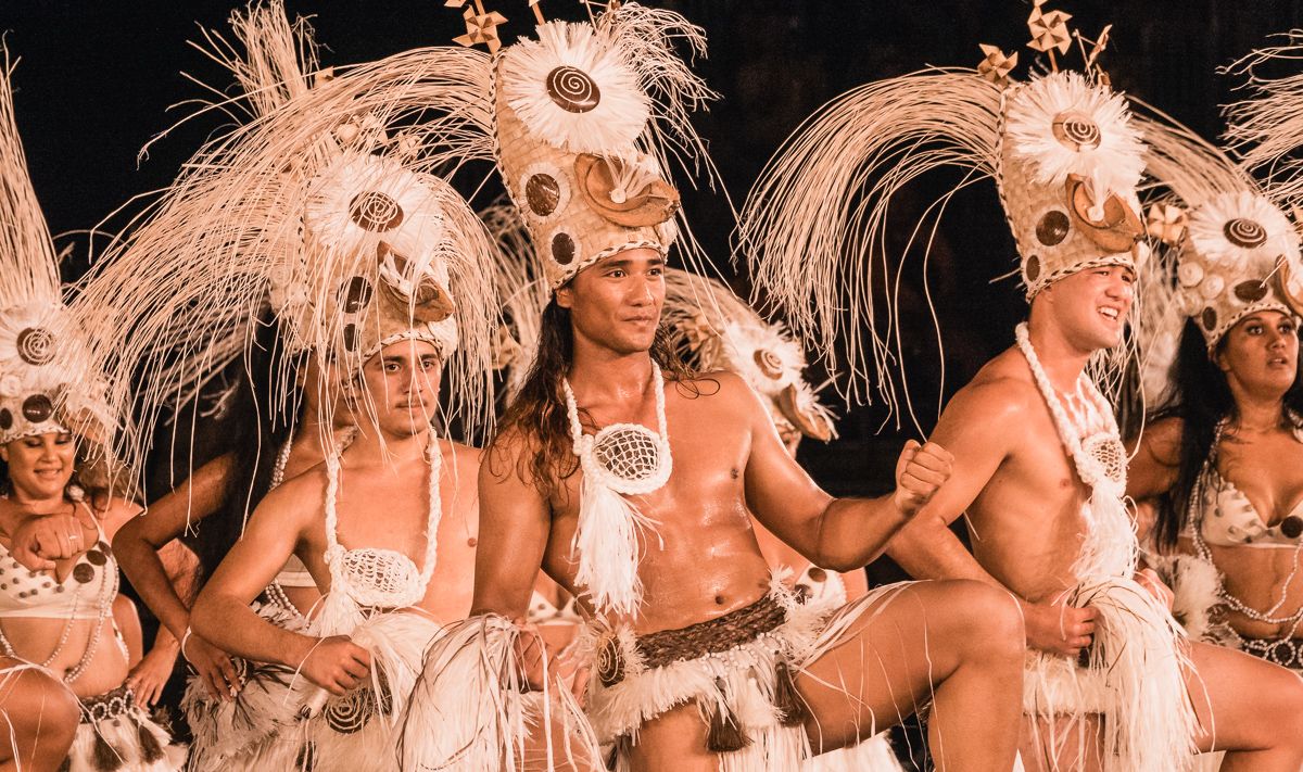 beautiful tahitian man performing exotic cultural dance