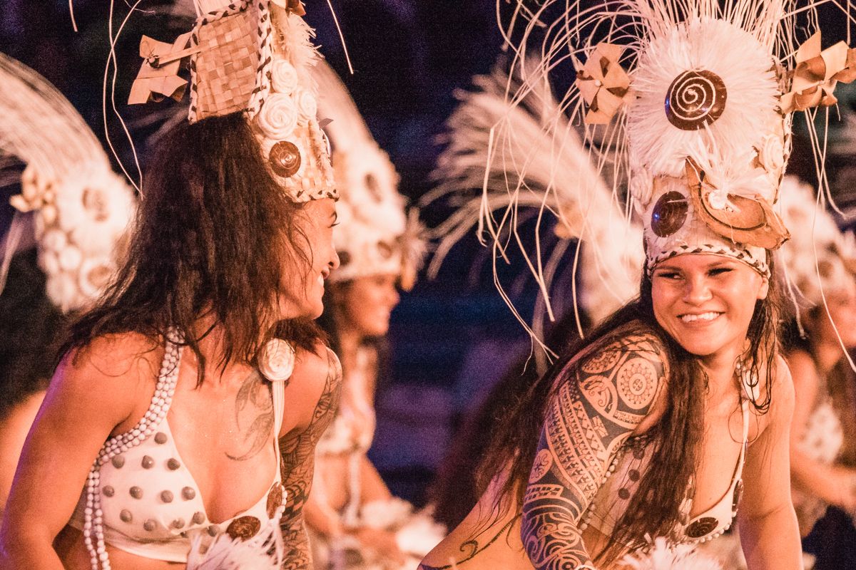 beautiful Polynesian dancers smiling