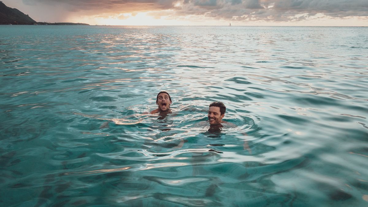 jason and jacob swimming in Tahiti french polynesia