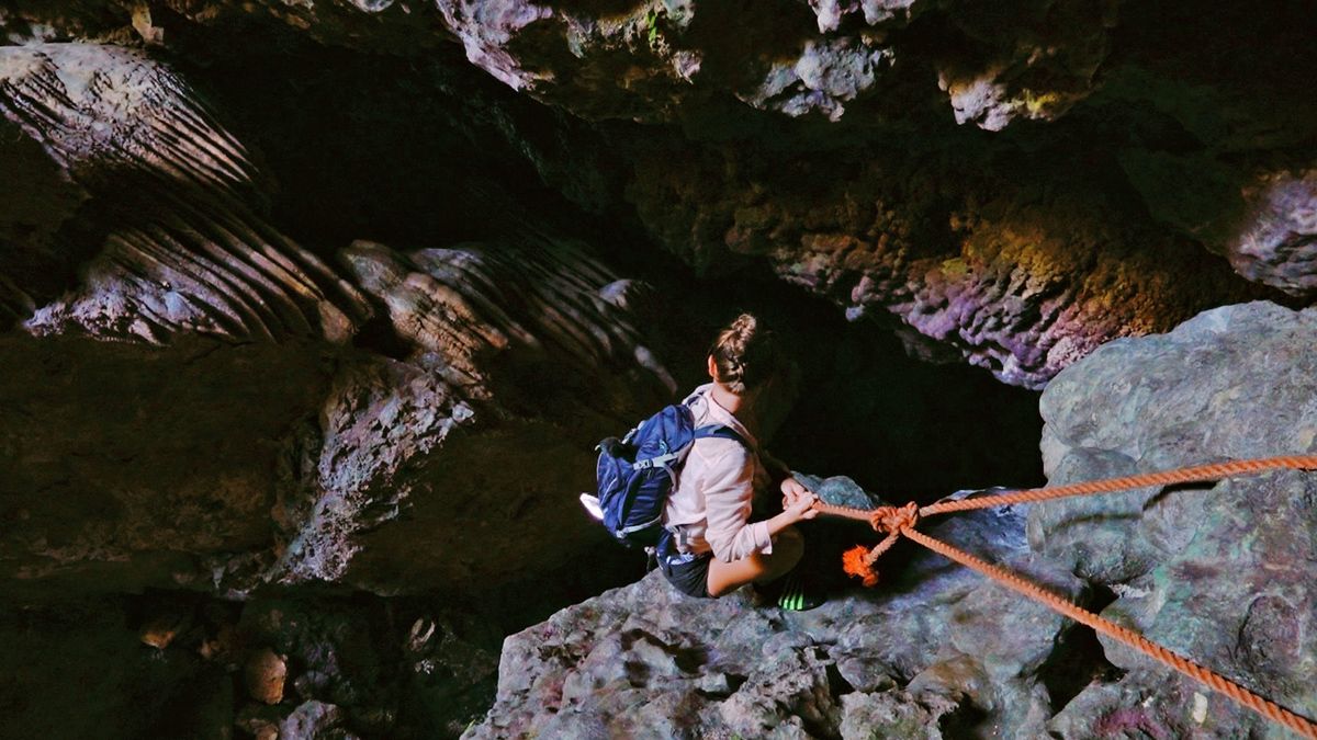 nikki wynn climbing down into the scariest cave in the south pacific