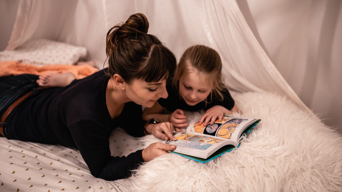 nikki wynn with niece reading a bedtime story